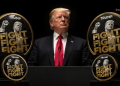 Donald Trump at a podium flanked by oversized gold coins reading 'FIGHT' against a black background