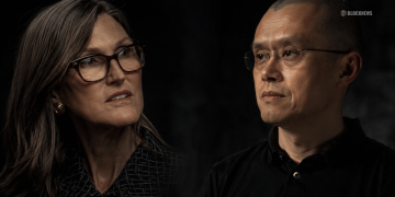 Cathie Wood Just Walked Back Her Binance Blame — Sort Of — and CZ Noticed Immediately