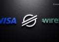 Three-dimensional logos on a dark textured background: blue 'VISA' on the left, a white stylized circular mark in the center, and green 'wirtex' on the right (Blocknews watermark top-right).