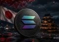 Close-up of a Solana coin with colorful logo, framed by a Japanese flag and night cityscape with a pagoda in the background