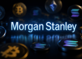 Bright Morgan Stanley sign glowing blue among floating crypto coins (Bitcoin, Ethereum) in a dark scene.