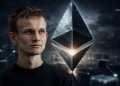 Man in a black shirt stands beside a glowing Ethereum logo in a futuristic digital background.